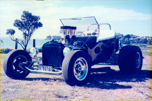 Faded photo of old hot-rod to be restored for a gift