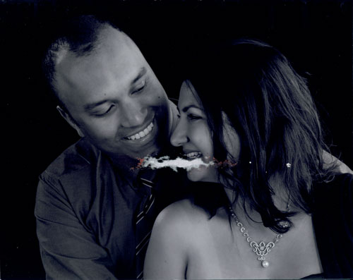 precious wedding photo ruined by large central tear 