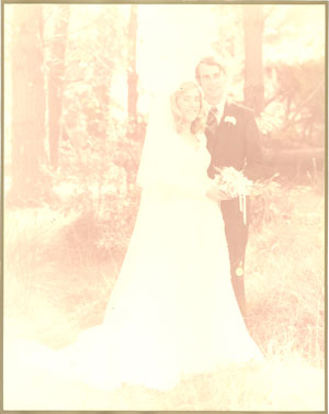 another badly faded and "blown-out" wedding photo for restoration