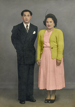 couple re-emerge from photo restoration looking flawless