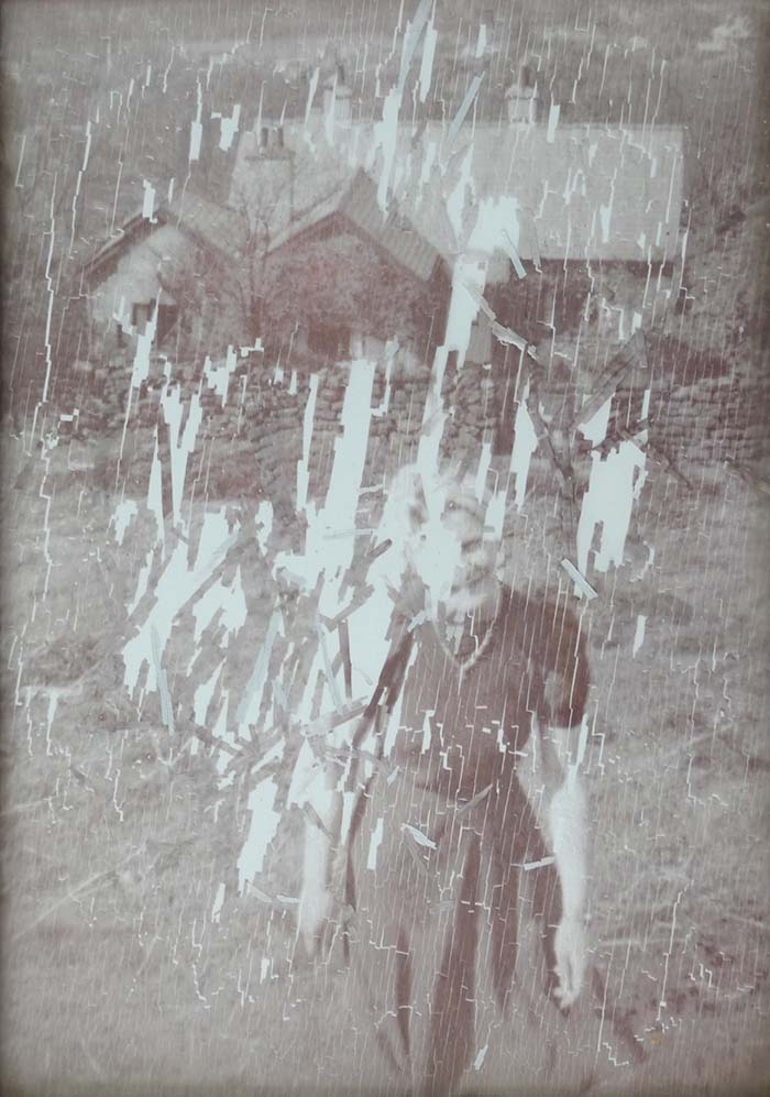 badly flaking photo brought in for restoration