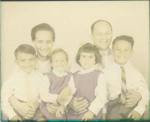 very faded large family photo comes in for restoration