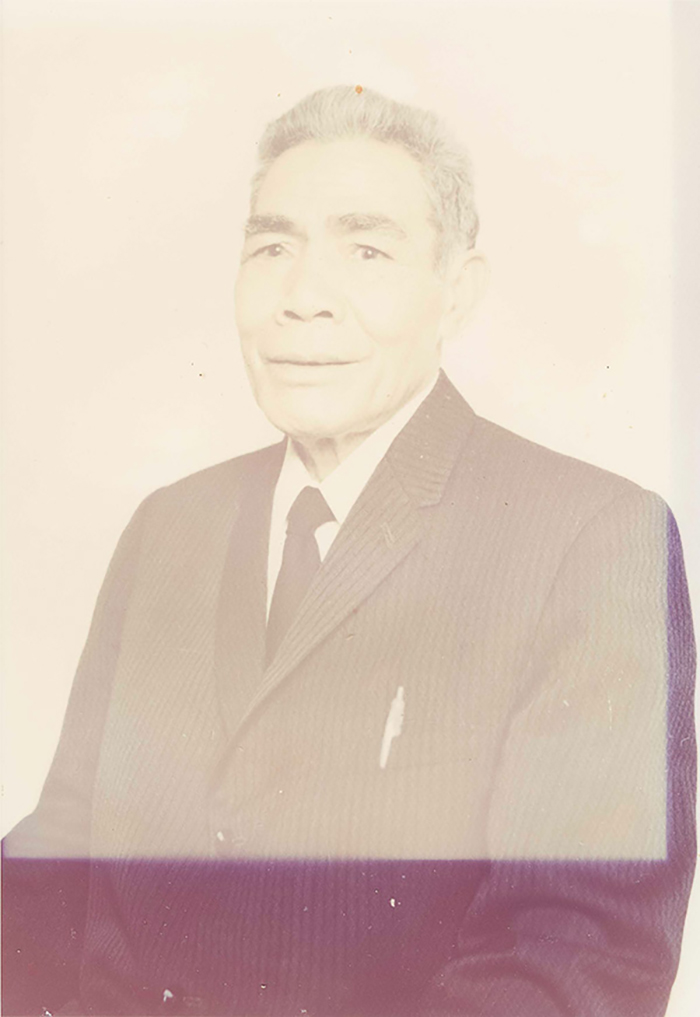 badly and irregularly faded image brought in for restorationfaded