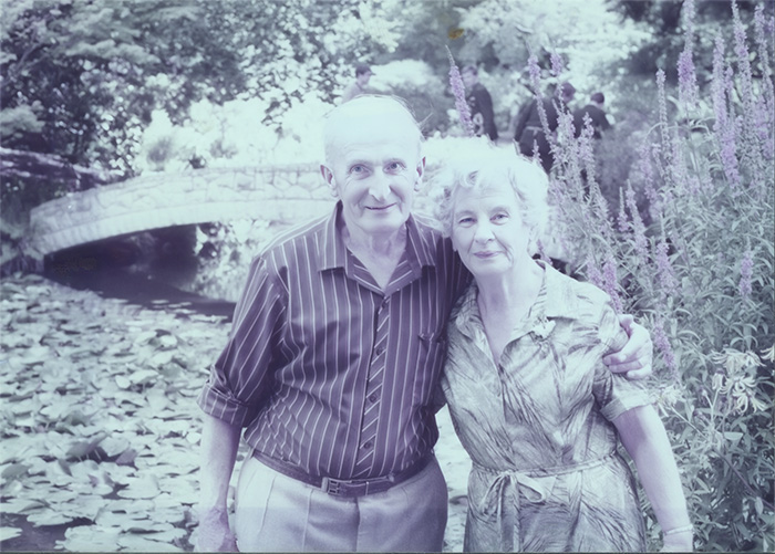 very faded and precious photo of mother and dad 