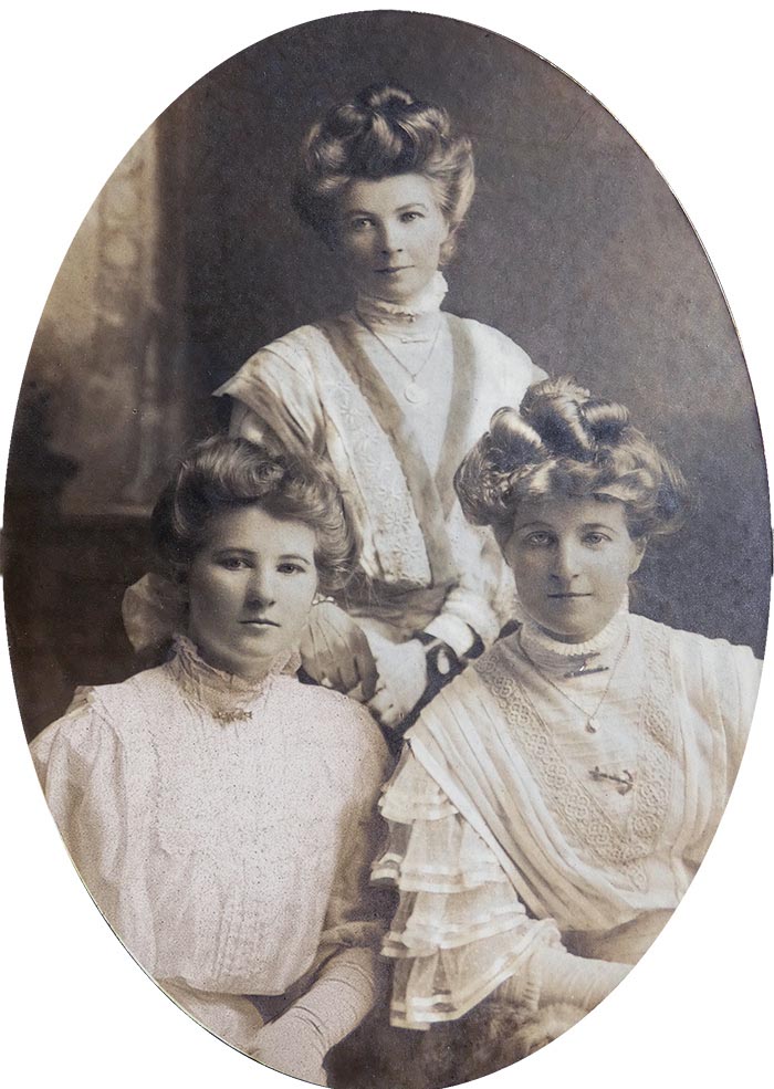 3 faces emerge from blur and smudging in this photo restoration