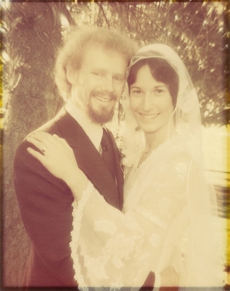 yellowed and badly faded A3 photo of bridal couple to be restored