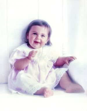 colour-corrected baby photo now matches those of her siblings