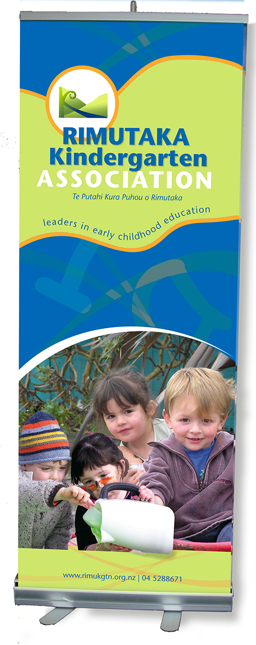 large banner for kindergarten association - carrying the buiness logo